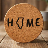 Illinois round cork coaster engraved with HOME using the state outline as the letter O