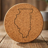 Illinois round cork coaster engraved with the state outline and Illinois in script lettering