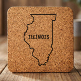Illinois square cork coaster engraved with the state outline and ILLINOIS in hand-drawn brush lettering