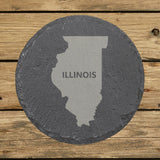 Illinois round slate coaster engraved with the state shape and ILLINOIS in bold lettering