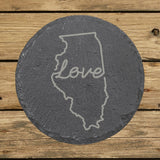 Illinois round slate coaster engraved with a hand-drawn state outline and love in cursive