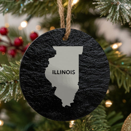 Illinois round slate Christmas ornament engraved with the state shape and ILLINOIS in bold lettering