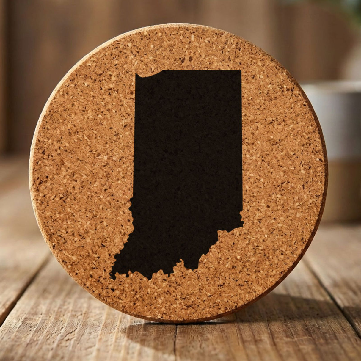 Indiana round cork coaster with the full state shape engraved