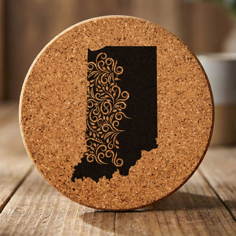 Indiana round cork coaster engraved with the state shape in ornate floral scrollwork