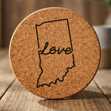 Indiana round cork coaster engraved with a hand-drawn state outline and love in cursive