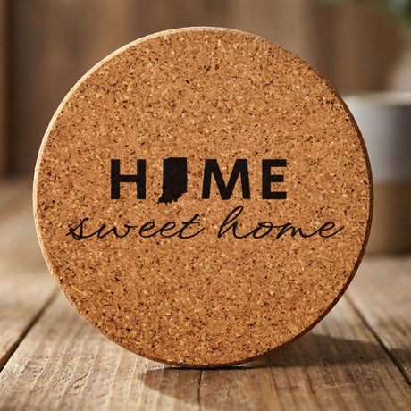 Indiana round cork coaster engraved with HOME sweet home using the state shape as the letter O