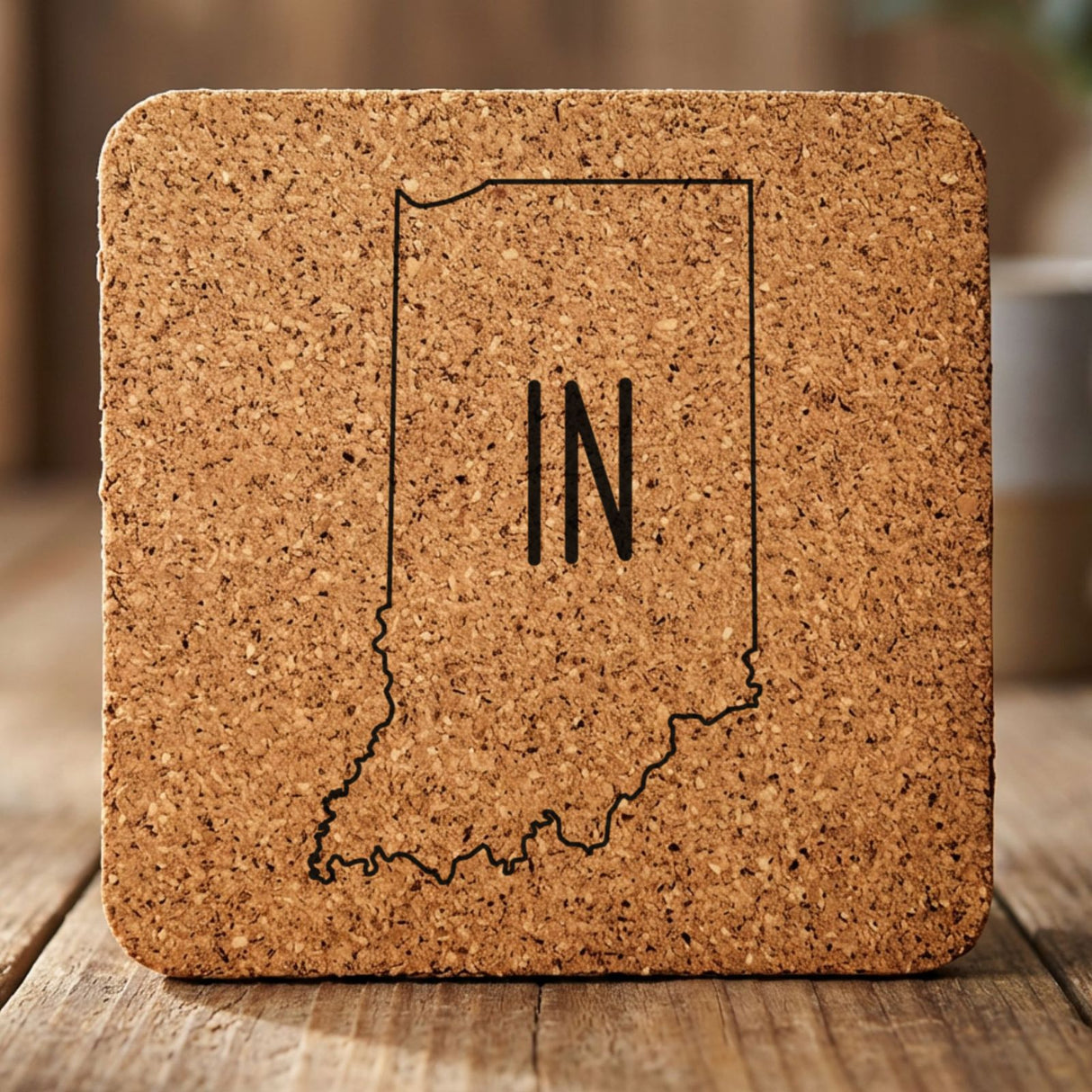 Indiana square cork coaster engraved with the state outline and IN initials