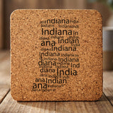Indiana square cork coaster engraved with a word cloud of repeating Indiana text