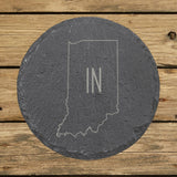 Indiana round slate coaster engraved with the state outline and IN initials