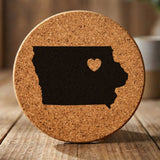 Iowa round cork coaster engraved with the state shape and a heart
