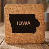 Iowa square cork coaster engraved with the state shape and IOWA in bold lettering