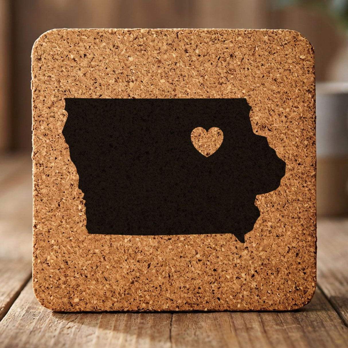 Iowa square cork coaster engraved with the state shape and a heart