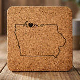 Iowa square cork coaster engraved with the state outline and home in script with a heart