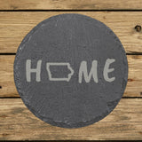 Iowa round slate coaster engraved with HOME using the state outline as the letter O