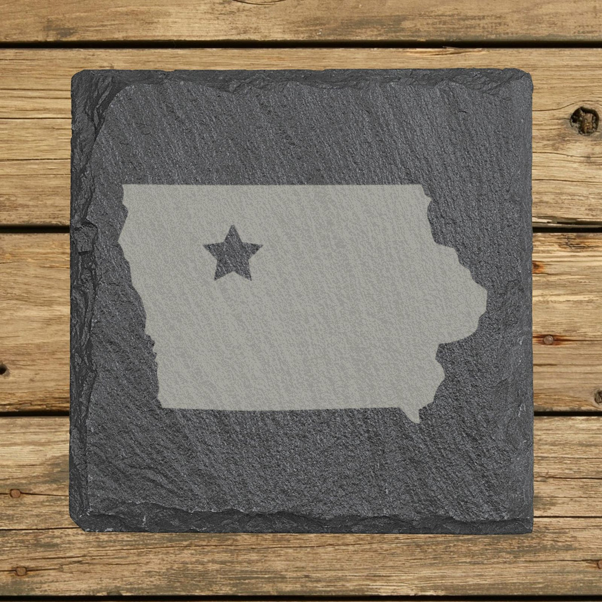 Iowa square slate coaster engraved with the state shape and a star
