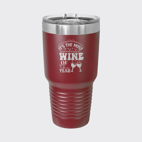 Maroon 30 oz tumbler laser engraved with "It's the Most Wonderful Wine of the Year"