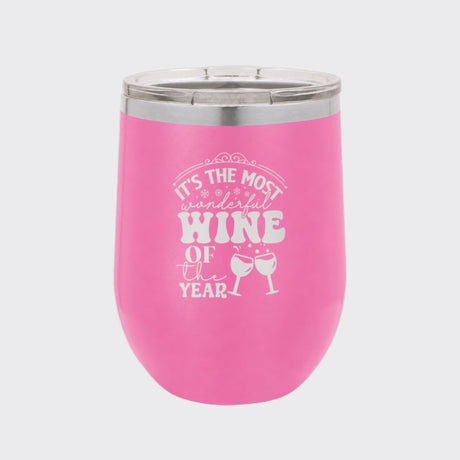 Pink 12 oz stemless wine tumbler laser engraved with "It's the Most Wonderful Wine of the Year"
