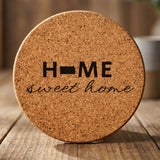 Kansas round cork coaster engraved with HOME sweet home using the state shape as the letter O