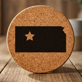Kansas round cork coaster engraved with the state shape and a star