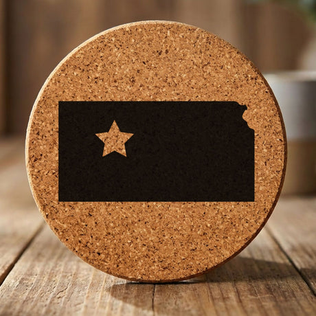 Kansas round cork coaster engraved with the state shape and a star