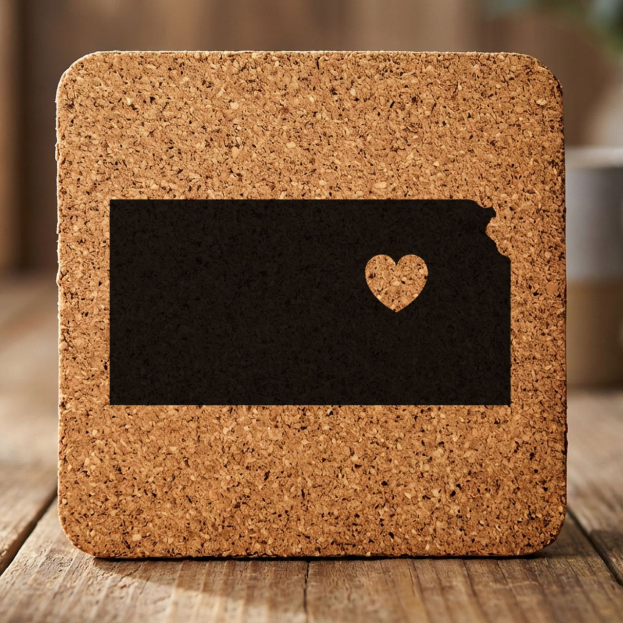 Kansas square cork coaster engraved with the state shape and a heart