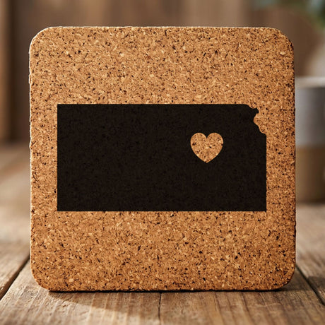 Kansas square cork coaster engraved with the state shape and a heart