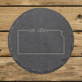 Kansas round slate coaster engraved with the state outline and est. 1861