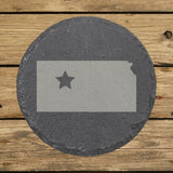 Kansas round slate coaster engraved with the state shape and a star