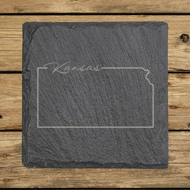 Kansas square slate coaster engraved with the state outline and Kansas in script lettering