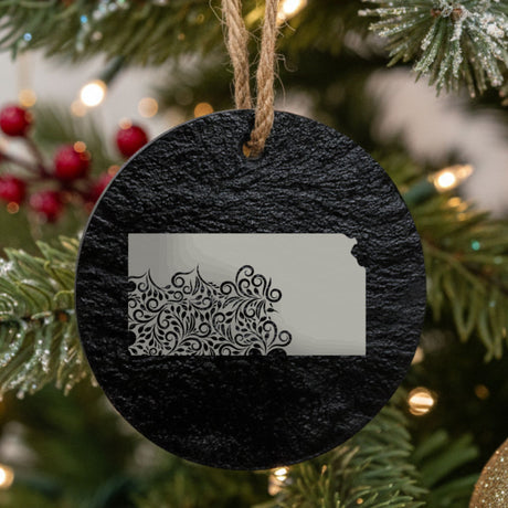 Kansas round slate Christmas ornament engraved with the state shape in ornate floral scrollwork