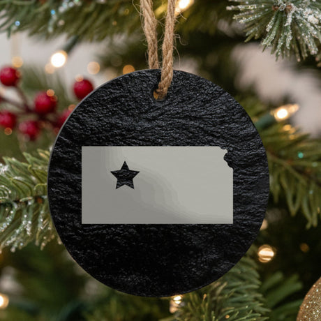 Kansas round slate Christmas ornament engraved with the state shape and a star