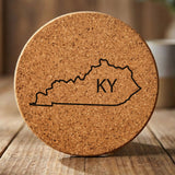 Kentucky round cork coaster engraved with the state outline and KY initials