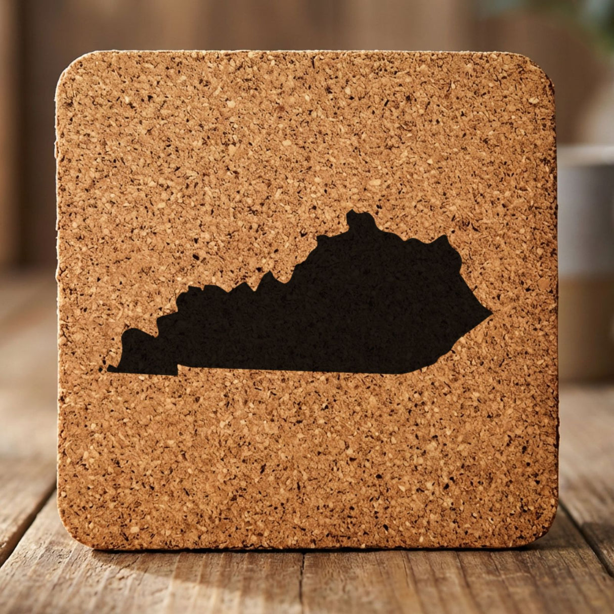 Kentucky square cork coaster with the full state shape engraved