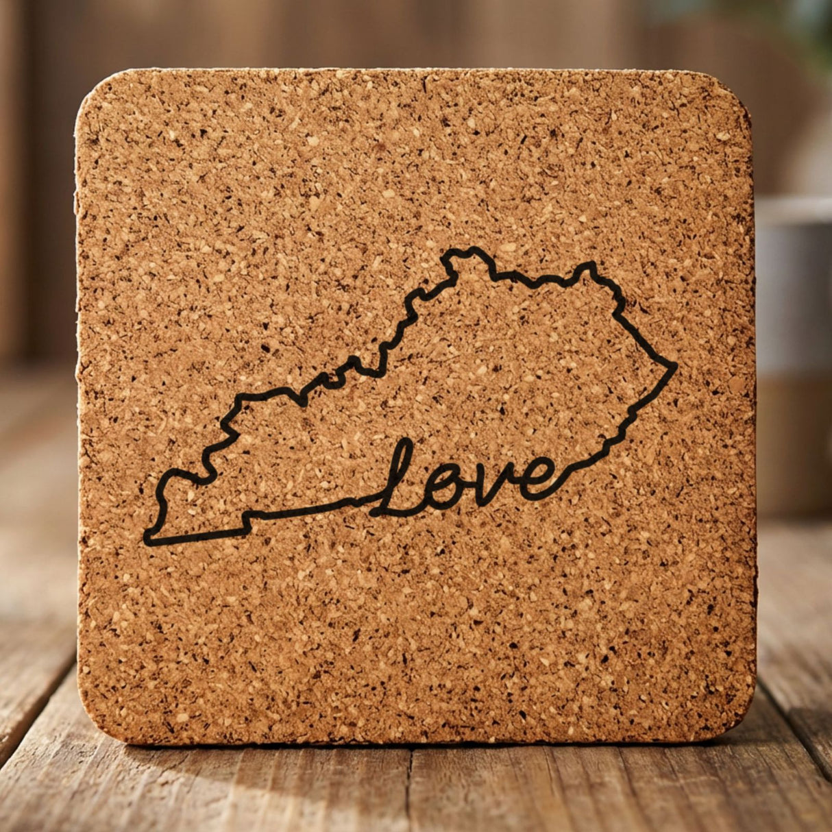 Kentucky square cork coaster engraved with a hand-drawn state outline and love in cursive