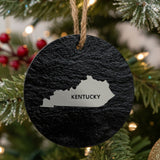 Kentucky round slate Christmas ornament engraved with the state shape and KENTUCKY in bold lettering