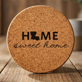 Louisiana round cork coaster engraved with HOME sweet home using the state shape as the letter O