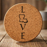 Louisiana round cork coaster engraved with LOVE stacked vertically using the state as the letter O