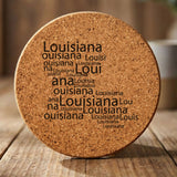 Louisiana round cork coaster engraved with a word cloud of repeating Louisiana text