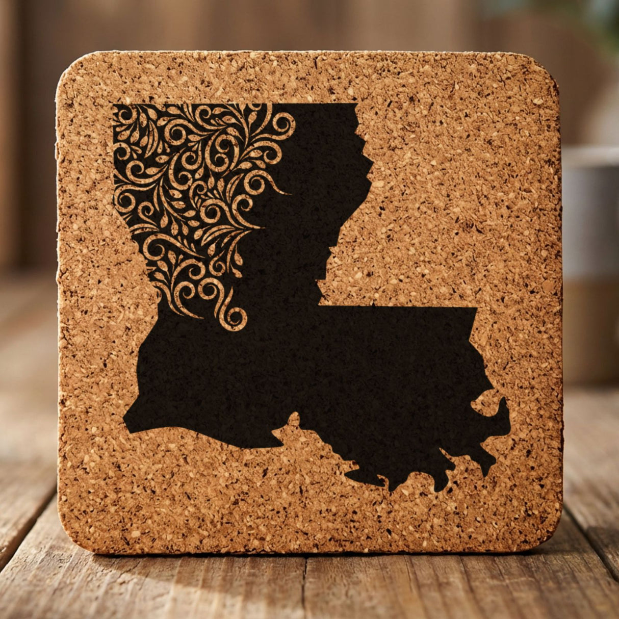Louisiana square cork coaster engraved with the state shape in ornate floral scrollwork