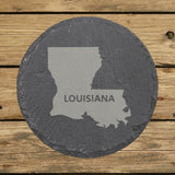 Louisiana round slate coaster engraved with the state shape and LOUISIANA in bold lettering