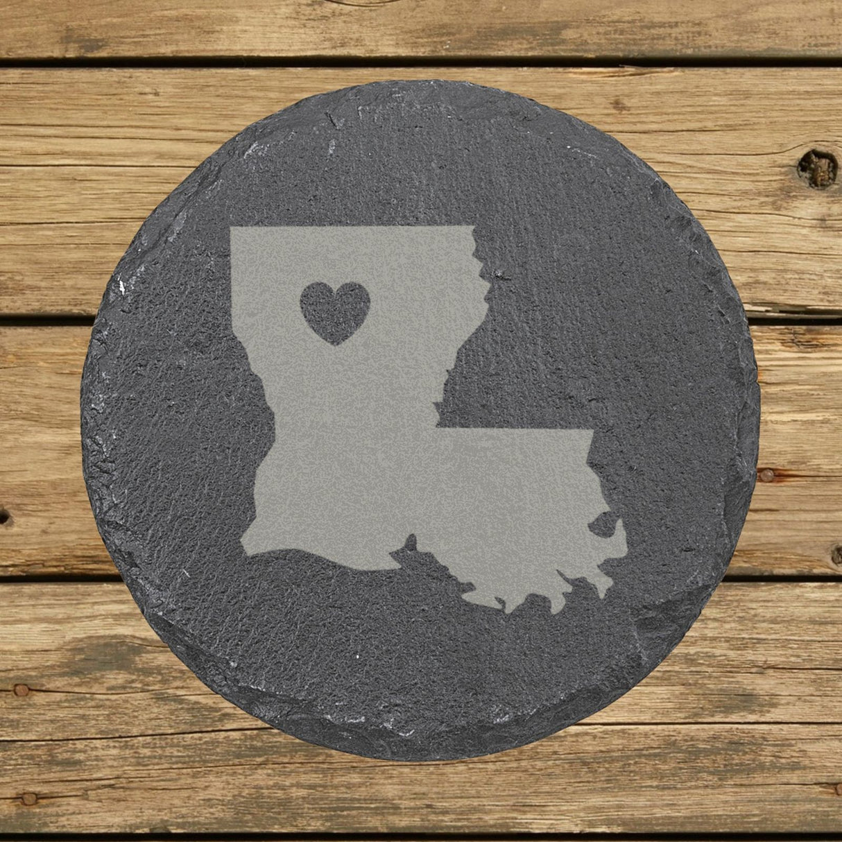 Louisiana round slate coaster engraved with the state shape and a heart