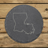Louisiana round slate coaster engraved with the state outline and home in script with a heart