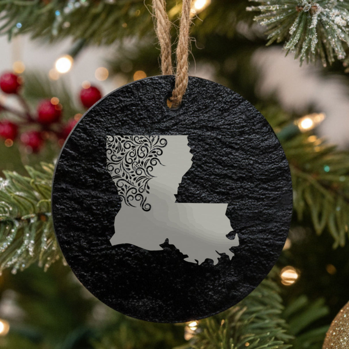 Louisiana round slate Christmas ornament engraved with the state shape in ornate floral scrollwork
