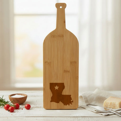 Bamboo wine bottle cutting board engraved with the Louisiana Star Accent design