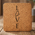 Maine square cork coaster engraved with LOVE stacked vertically using the state as the letter O
