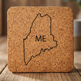 Maine square cork coaster engraved with the state outline and ME initials