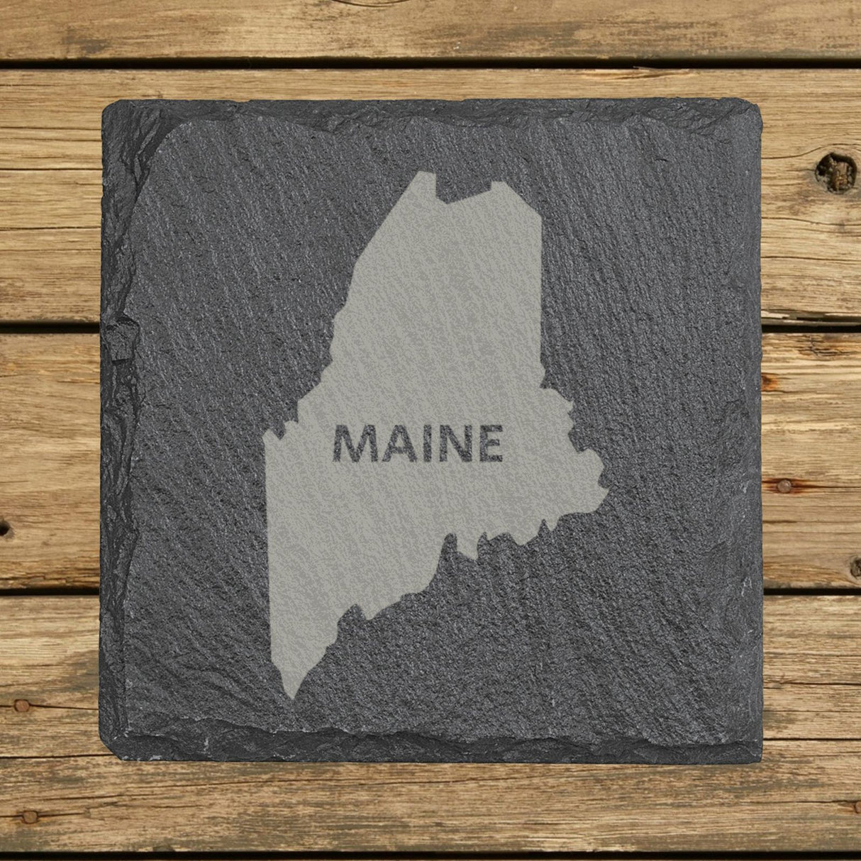 Maine square slate coaster engraved with the state shape and MAINE in bold lettering