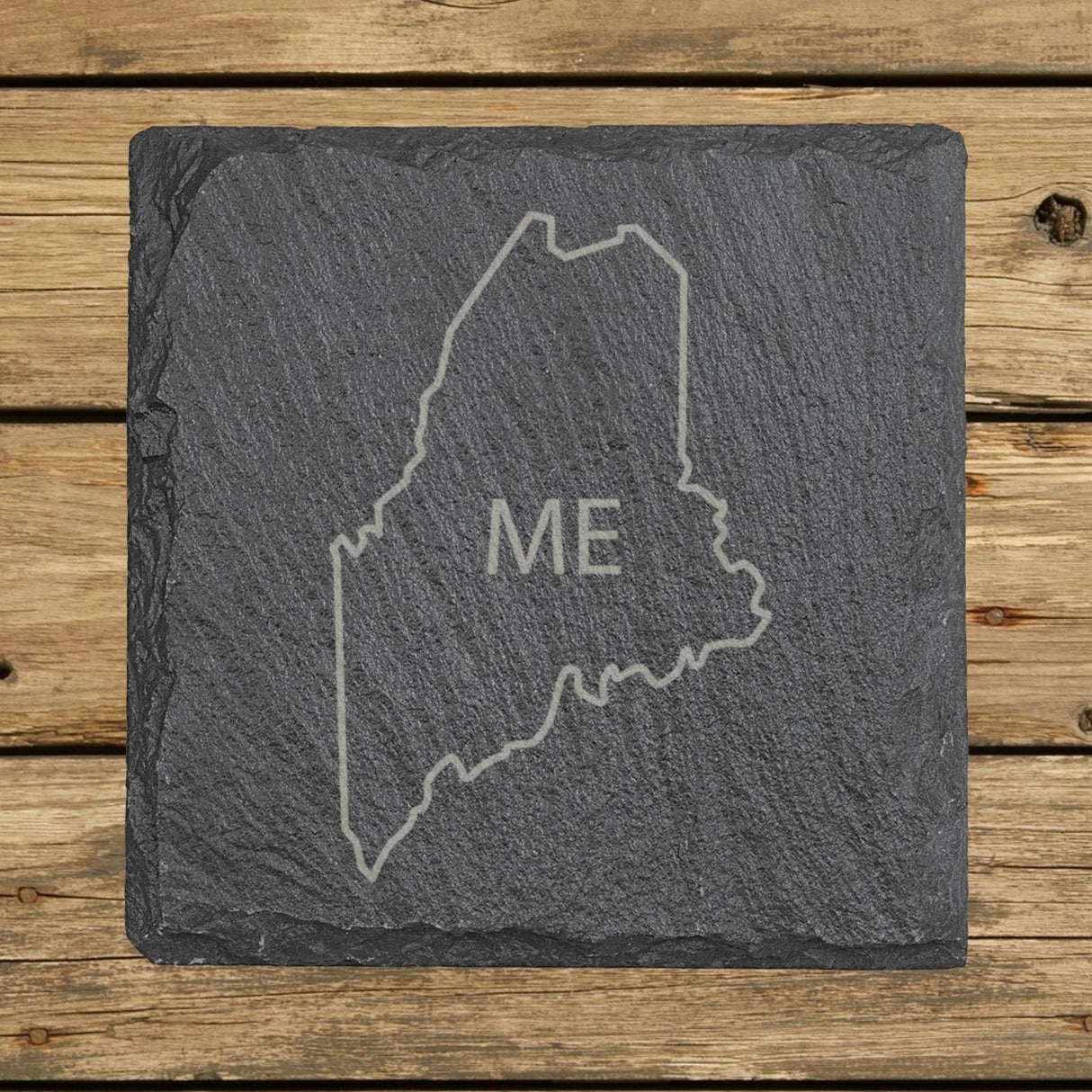 Maine square slate coaster engraved with the state outline and ME initials