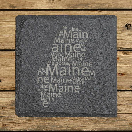 Maine square slate coaster engraved with a word cloud of repeating Maine text