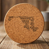 Maryland round cork coaster engraved with a word cloud of repeating Maryland text
